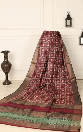 Maroon printed tussar saree with zari border
