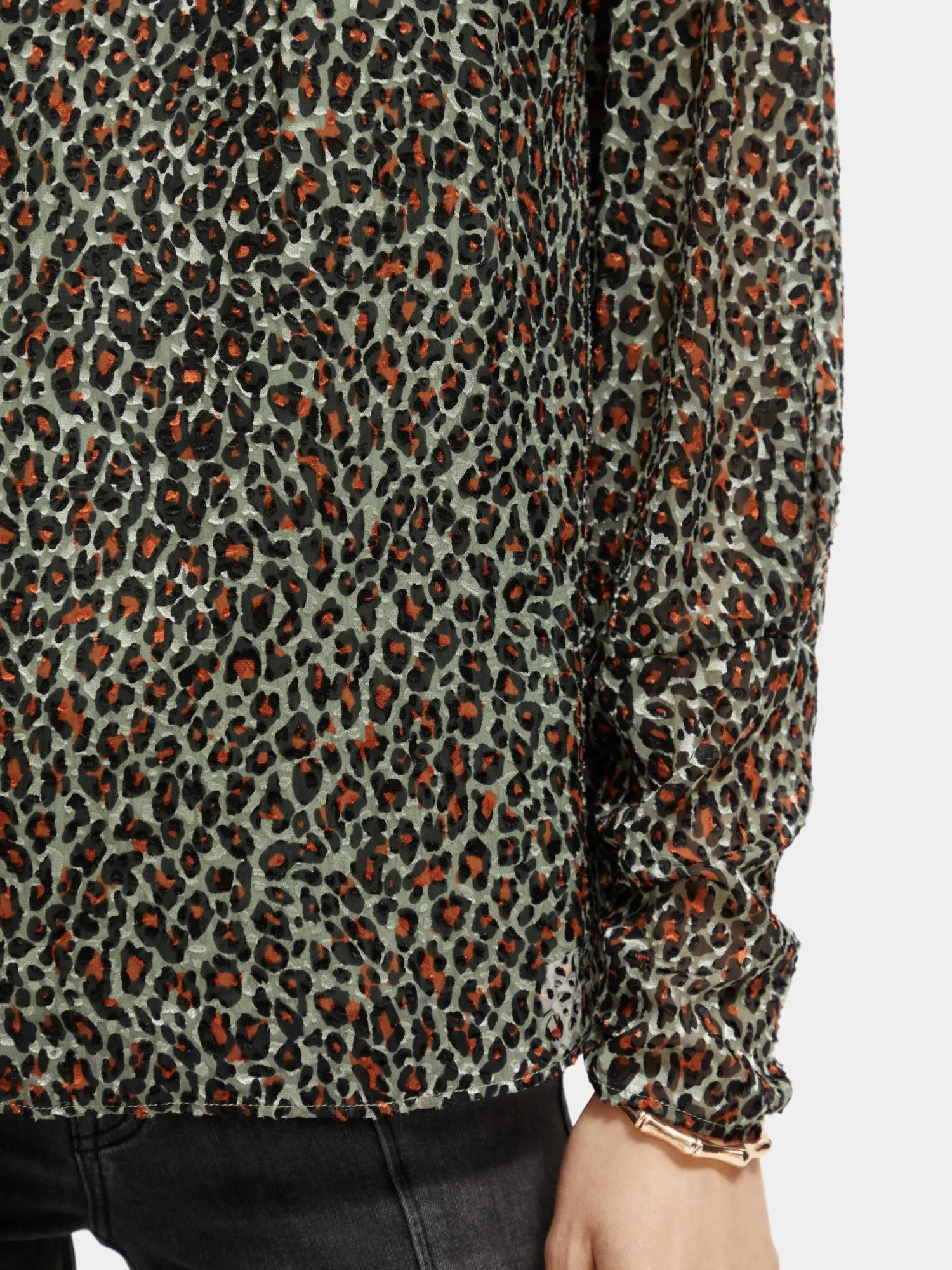 Mock neck open back blouse